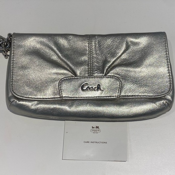 Coach Wristlet in Silver/Gold Depending on Lighting - Picture 9 of 13